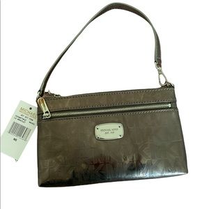 Micheal Kors jet set item large wristlet in nickel